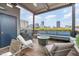 Inviting patio with a comfortable seating area, ideal for relaxing at 117 S Bloodworth St, Raleigh, NC 27601