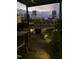 Scenic rooftop deck with outdoor furniture and a fire pit, ideal for enjoying evenings with city skyline views at 117 S Bloodworth St, Raleigh, NC 27601
