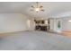 Bright, open-concept living space with kitchen, and living areas that flow seamlessly at 11771 Raleigh Rd, Four Oaks, NC 27524