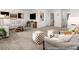 Spacious living room featuring modern decor, carpet floors, a TV and ample seating arrangements at 141 N District Ave # 295, Clayton, NC 27527