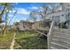 View of deck, stairs, yard, and fencing at 1968 Shadow Glen Dr, Raleigh, NC 27604
