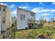 Home backyard with a raised wooden deck, grassy yard area, and a wood fence surrounding the property at 1968 Shadow Glen Dr, Raleigh, NC 27604