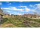 Spacious backyard featuring a grass lawn and framed by a classic wooden fence for privacy at 1968 Shadow Glen Dr, Raleigh, NC 27604