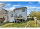Rear exterior of home with deck at 1968 Shadow Glen Dr, Raleigh, NC 27604