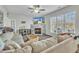 Bright living room with a fireplace, decor, and comfortable seating with a ceiling fan at 1968 Shadow Glen Dr, Raleigh, NC 27604