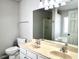 Well-lit bathroom features a double vanity and separate tub and shower at 204 Hillview Dr, Durham, NC 27703