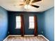 Bedroom with windows and ceiling fan at 204 Hillview Dr, Durham, NC 27703