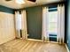 Bedroom with two windows and closet at 204 Hillview Dr, Durham, NC 27703