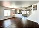 Spacious living room with gleaming hardwood floors, neutral paint, lots of windows, and an open floor plan at 204 Hillview Dr, Durham, NC 27703