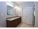 Bathroom features granite countertop on double sink vanity and tiled floor at 2144 Waterview Dr, Graham, NC 27253