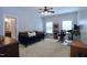 Spacious bedroom with neutral colors, large windows, and ample space for a comfortable living at 2144 Waterview Dr, Graham, NC 27253