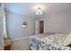 Bedroom featuring a soft color palette, carpeted floors, and a full-sized bed at 2144 Waterview Dr, Graham, NC 27253