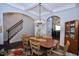 Inviting dining room with natural light and elegant décor at 2144 Waterview Dr, Graham, NC 27253