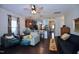 Spacious living room flowing into the kitchen, featuring hardwood floors and natural light at 2144 Waterview Dr, Graham, NC 27253