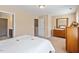 Bedroom view with ensuite bathroom and large windows with bright light at 2306 Stoney Spring Dr, Raleigh, NC 27610