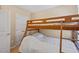 Bedroom with bunkbeds and carpet floors, offering a cozy and functional space at 2306 Stoney Spring Dr, Raleigh, NC 27610