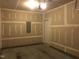 Unfinished garage, offering a blank canvas for customization and storage solutions at 2306 Stoney Spring Dr, Raleigh, NC 27610