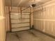 Spacious garage with a modern door and ample room for parking and storage at 2306 Stoney Spring Dr, Raleigh, NC 27610