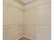 Walk-in closet featuring customizable shelving and ample storage at 2306 Stoney Spring Dr, Raleigh, NC 27610