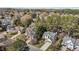 Aerial view of residential neighborhood with mature trees and landscaping on a sunny day at 2613 Coxindale Dr, Raleigh, NC 27615