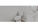 Simple bathroom featuring a toilet and vanity at 2613 Coxindale Dr, Raleigh, NC 27615