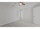 Bright bedroom with a large window, closet, and ceiling fan, providing a comfortable space at 2613 Coxindale Dr, Raleigh, NC 27615