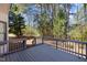 Relax on this spacious deck with a beautiful tree-lined backyard view, perfect for outdoor gatherings at 2613 Coxindale Dr, Raleigh, NC 27615