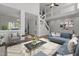 Staged living room featuring hardwood floors, high ceilings, and comfortable furniture at 2613 Coxindale Dr, Raleigh, NC 27615