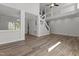 Bright living room featuring hardwood floors, high ceilings, and an open-concept design at 2613 Coxindale Dr, Raleigh, NC 27615