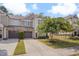 Charming townhome featuring a two-car garage, manicured landscaping, and a welcoming front facade at 300 Mariah Towns Way, Garner, NC 27529