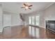 Living room with hardwood floors, staircase and fireplace at 300 Mariah Towns Way, Garner, NC 27529