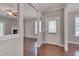 Bright living room with hardwood floors, a fireplace, and abundant natural light at 300 Mariah Towns Way, Garner, NC 27529