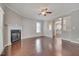 Spacious living room offers hardwood floors, a fireplace, and plenty of natural light at 300 Mariah Towns Way, Garner, NC 27529