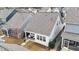 Aerial view of the backyard with a small patio seating area and landscaping at 308 Masden Rd, Holly Springs, NC 27540