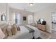 Serene bedroom with a dresser, natural light, and neutral decor at 308 Masden Rd, Holly Springs, NC 27540
