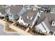 Aerial view of a two-story home with a well-manicured lawn and front yard at 308 Masden Rd, Holly Springs, NC 27540