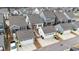 Aerial view of neighborhood featuring homes with attached garages and backyard spaces at 308 Masden Rd, Holly Springs, NC 27540