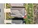 Aerial view of home highlighting the roof, landscaped yard, and patio space at 310 Macallan, Burlington, NC 27215
