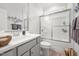 Bathroom featuring a white vanity, a shower with sliding glass doors, and a toilet at 310 Macallan, Burlington, NC 27215