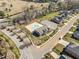 Aerial shot showing a community pool area with seating, landscaping and nearby homes at 310 Macallan, Burlington, NC 27215