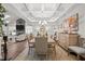 Open-concept dining area boasts coffered ceilings and a view of the living area at 310 Macallan, Burlington, NC 27215