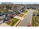 Charming street view with well-manicured lawns and beautiful home exteriors at 310 Macallan, Burlington, NC 27215