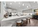 Gourmet kitchen with quartz countertops, stainless appliances and island seating at 310 Macallan, Burlington, NC 27215