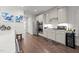 Well-equipped kitchen with stainless appliances, white cabinets, and modern finishes at 310 Macallan, Burlington, NC 27215
