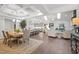 This open concept layout includes kitchen, dining area, and living room at 310 Macallan, Burlington, NC 27215