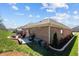 Brick home exterior showcasing a charming patio, perfect for outdoor entertaining at 310 Macallan, Burlington, NC 27215