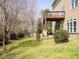 Backyard view of a deck overlooking a lush green lawn at 314 Montelena Pl, Cary, NC 27513