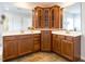 Bathroom featuring a double vanity, a large mirror, and plenty of cabinet space for storage at 314 Montelena Pl, Cary, NC 27513