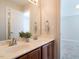 Bathroom featuring a double sink vanity, a large mirror, and neutral decor and finishes at 314 Montelena Pl, Cary, NC 27513
