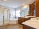 Elegant bathroom featuring dual sinks, a shower and a tub at 314 Montelena Pl, Cary, NC 27513